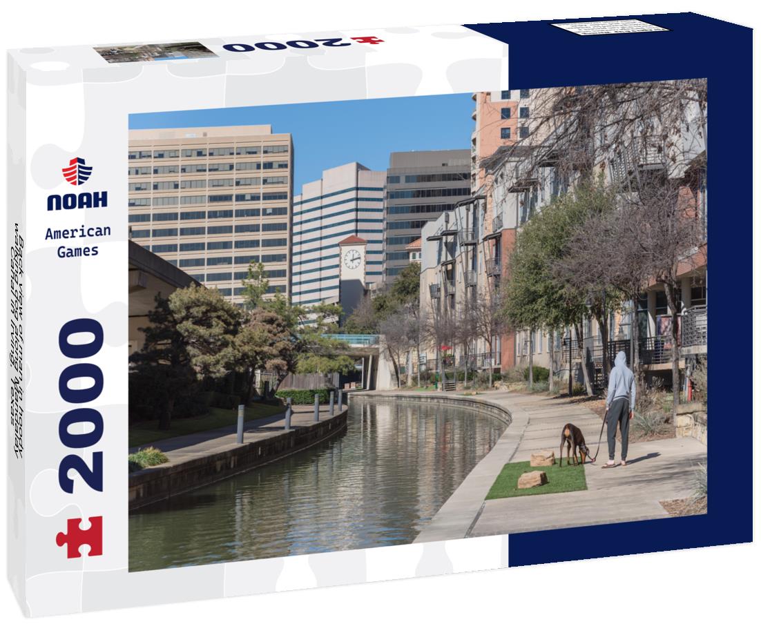 Noah Jigsaw Puzzle Back view of man in hoody walking dog along Mandalay Canal in Irving, Texas, USA 2000 pieces