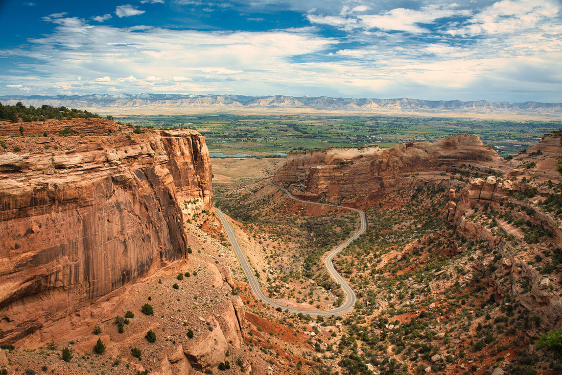Noah Jigsaw Puzzle Colorado National Monument preserves one of the grand landscapes of the American West. curvy highway in the valley 2000 pieces