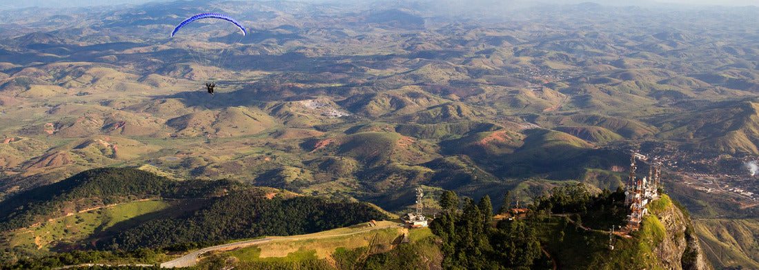 Noah Jigsaw Puzzle Aerial landscape in Governador Valadares with paraglider and Ibituruna peak and Rio Doce valley, Brazil, panorama Panorama 1000 Pieces