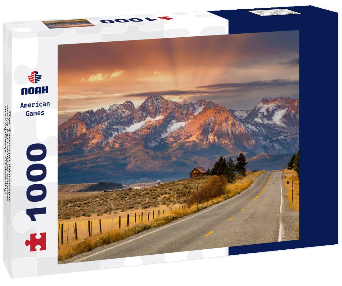 The Sawtooth Mountains and a log cabin at sunrise and highway 75 leading to Stanley, Idaho 1000pc Puzzle