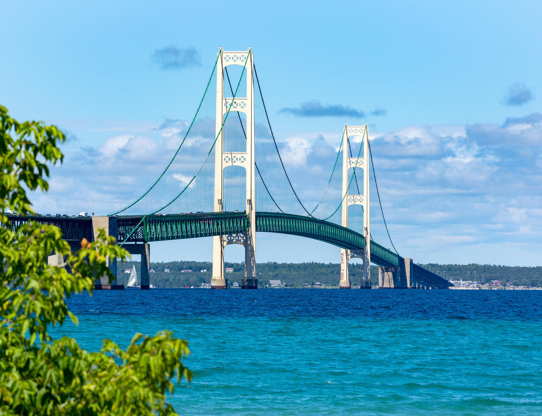 Noah Jigsaw Puzzle The Mackinac Bridge on a summer day. A suspension bridge over the Straits of Mackinac, connecting Michigan's Upper and Lower Peninsulas. Puffy clouds in the blue sky 1000 Pieces