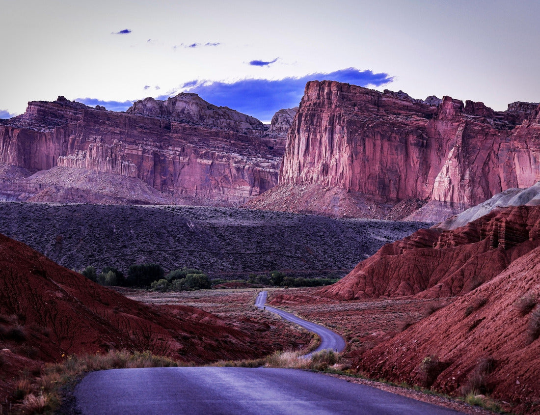 Noah Jigsaw Puzzle West face of the Waterpocket Fold along the Capitol Reef Scenic Drive in Capitol Reef National Park photographed from the park scenic drive at dusk 1000 Pieces