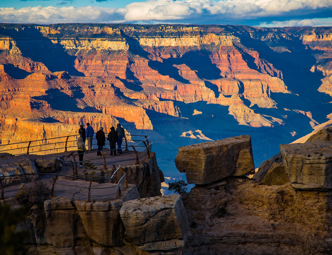 Noah Jigsaw Puzzle Grand Canyon National Park, Arizona. A group of tourists gather at a viewpoint on the south rim as the sun is casting long shadows 1000 Pieces