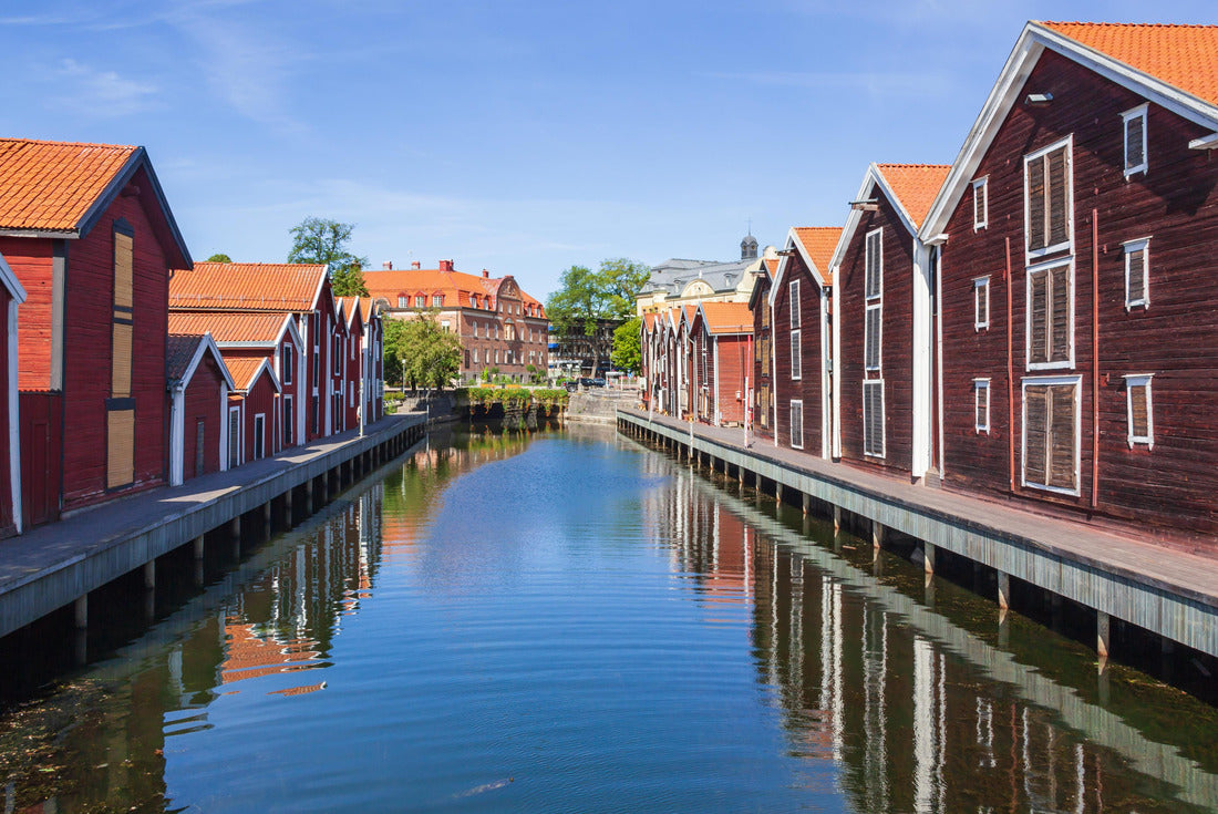 Old red wooden halls on the waterfront in the historic center of Hudiskvall, Sweden 2000pc Puzzle