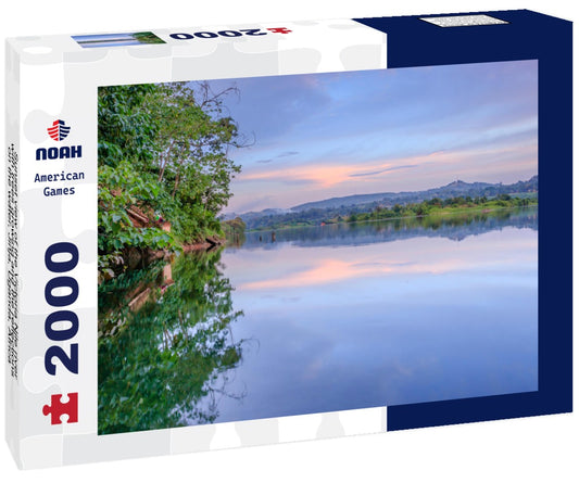 Noah Jigsaw Puzzle Sunset view of the Victoria Nile river, with trees growing and the reflections on the water, Jinja, Uganda, Africa 2000 pieces