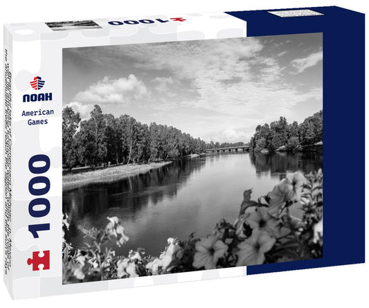 Noah Jigsaw Puzzle Beautiful lake of Camecuaro Michoacán, Mexico, with its amazing turquoise water, where the roots of the ahuehuete trees reach the lagoon and the sun's rays pass through the branches of the trees in black white 1000 pieces