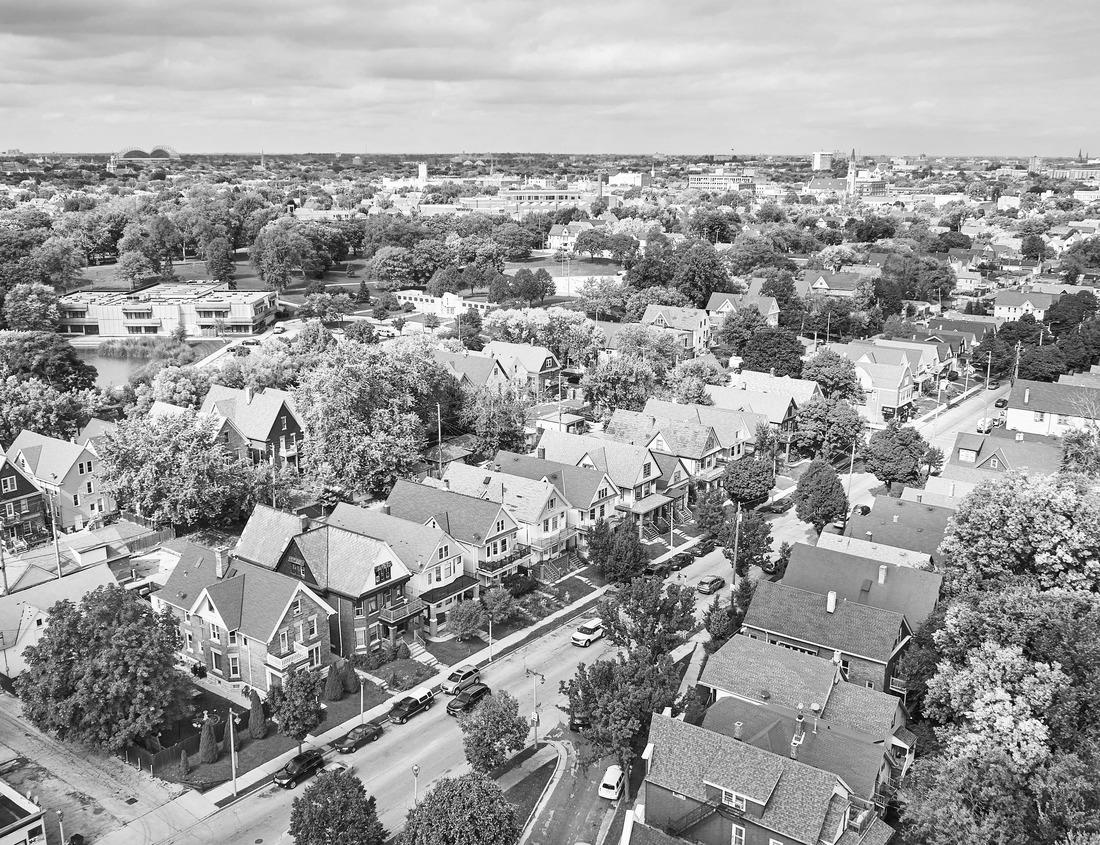 Noah Jigsaw Puzzle White architecture in Santorini island, Greece. Beautiful view of Oia town at sunset. Travel and vacation concept in black white 1000 pieces