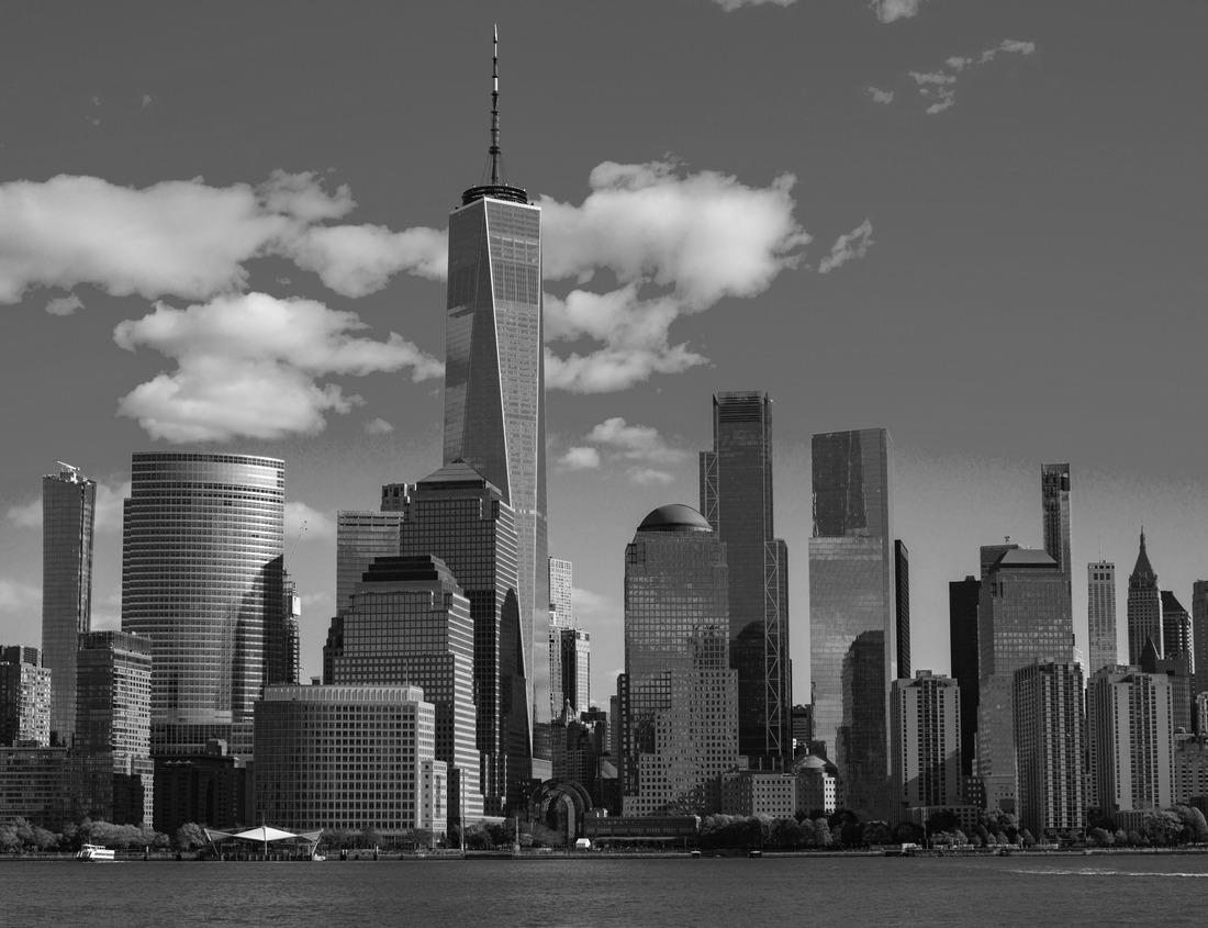 Noah Jigsaw Puzzle Aerial night cityscape with small residential buildings, illuminated mosque with a minaret and distant lights of ships in the sea, Istanbul, Turkey in black white 1000 pieces
