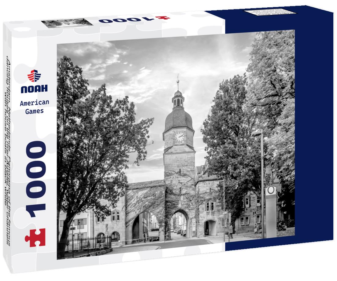 Noah Jigsaw Puzzle Amsterdam, Netherlands. Panorama of the famous dancing houses on the river Amstel, water channels with house boats in black white 1000 pieces