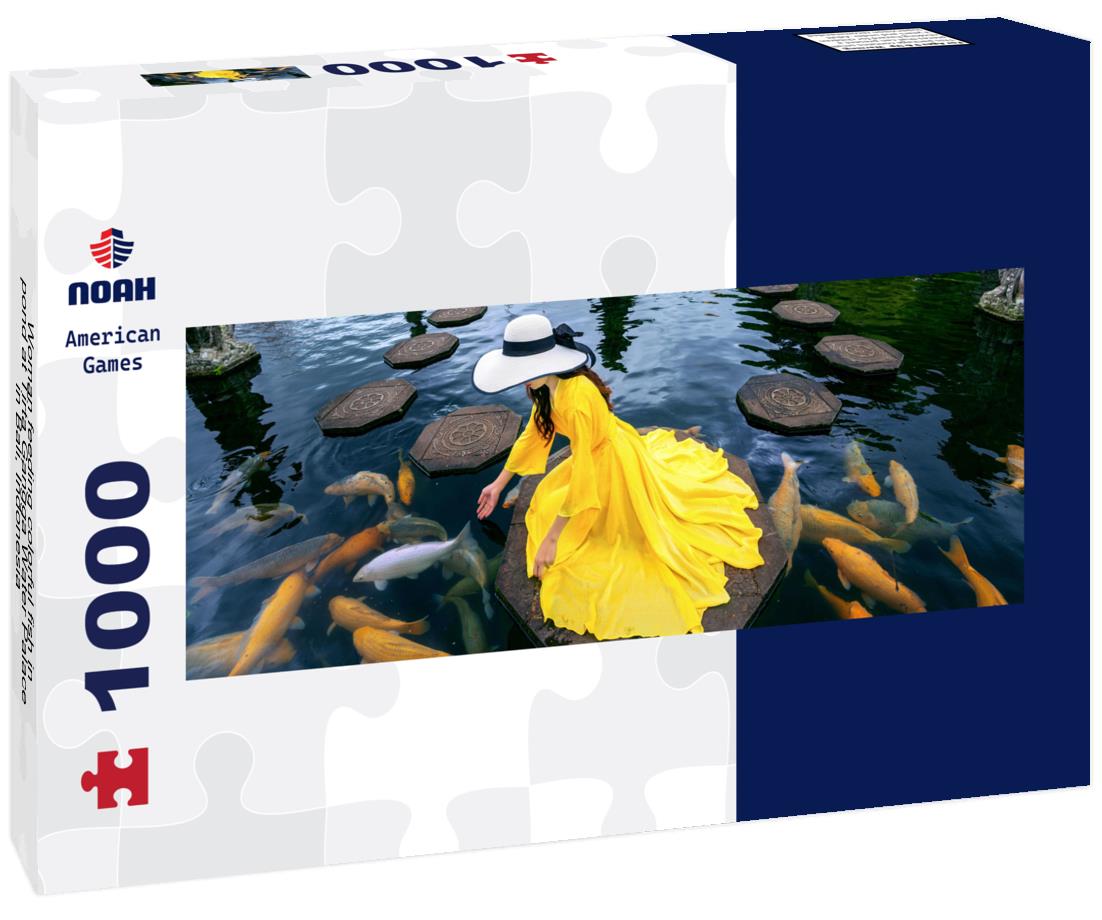 Noah Jigsaw Puzzle Woman feeding colorful fish in pond at Tirta Gangga Water Palace in Bali, Indonesia panorama 1000 pieces