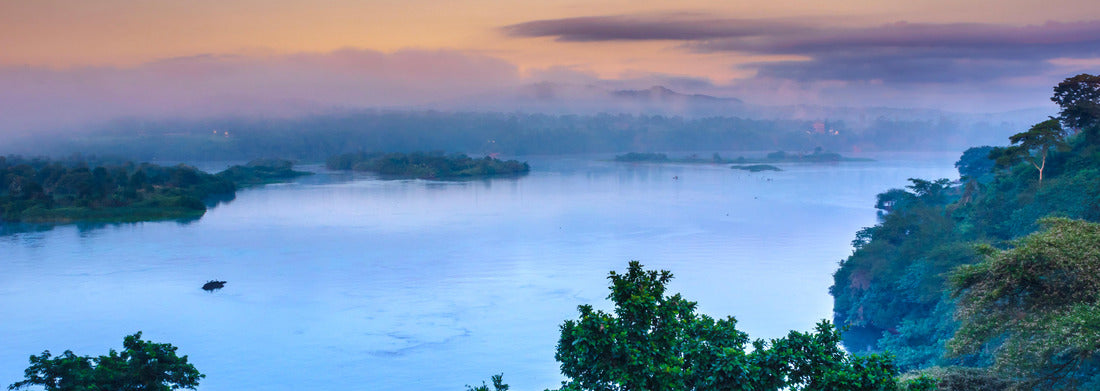 Noah Jigsaw Puzzle Sunset view of the Victoria Nile river, with trees growing and the reflections on the water, Jinja, Uganda, Africa panorama 1000 pieces
