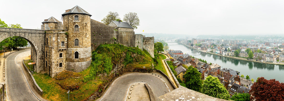 Noah Jigsaw Puzzle Citadel of Namur fortress walls with curved road and Meuse river with city panorama, Namur, Wallonia, Belgium panorama 1000 pieces