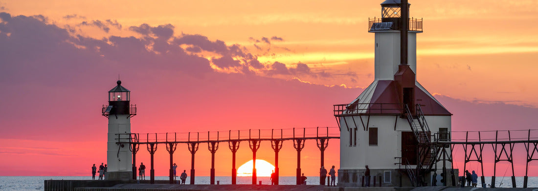 Noah Jigsaw Puzzle At the summer solstice, the sun rises over Lake Michigan between the Inner and Outer North Lighthouse in St. Joseph, Michigan panorama 1000 pieces
