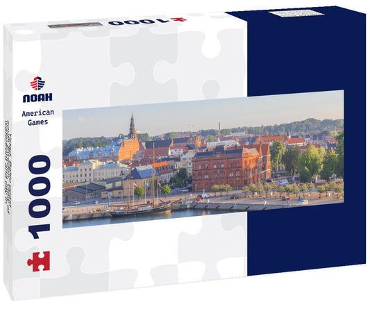Noah Jigsaw Puzzle Ystad, Baltic coast, south Sweden. View of waterfront and city in rays of rising sun panorama 1000 pieces