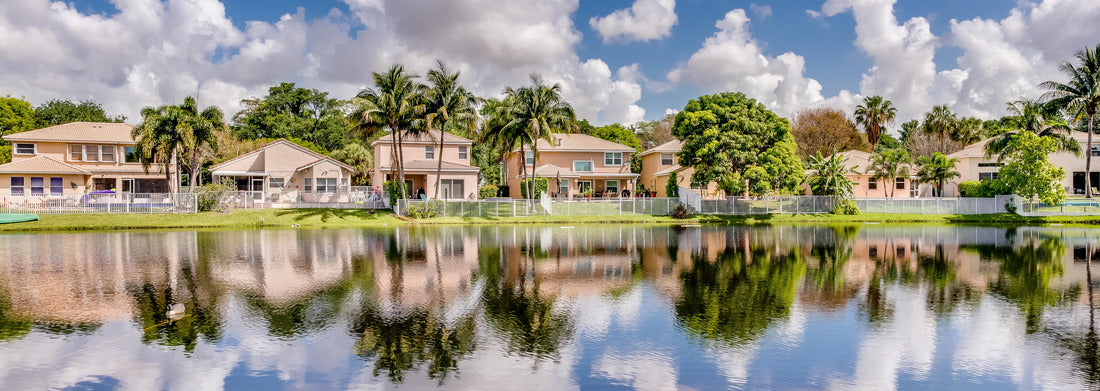 Noah Jigsaw Puzzle Coconut Creek FL: View of a lake and surrounding homes panorama 1000 pieces