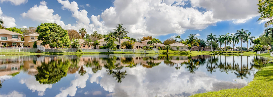 Noah Jigsaw Puzzle Coconut Creek FL: View of a lake and surrounding homes panorama 1000 pieces