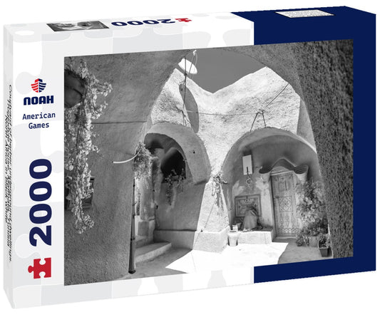 Noah Jigsaw Puzzle Courtyard of berber underground dwellings. Troglodyte house. Matmata, Tunisia, North Africa in black white 2000 pieces