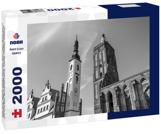 Noah Jigsaw Puzzle Poland, Guben, Gubin: Tower of old city hall and ruin of historic Parish church from below in the city center of the small town near German Polish border with blue sky in the background in black white 2000 pieces