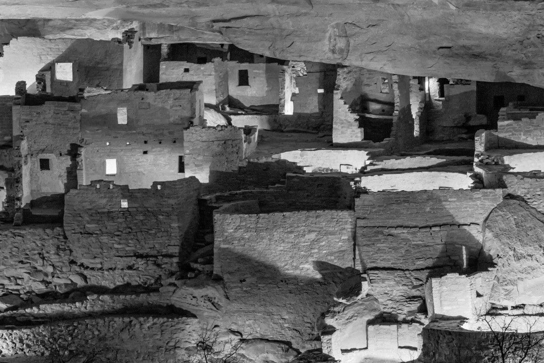 Noah Jigsaw Puzzle Cliff Palace, the largest cliff dwelling in North America, illuminated once a year during the Luminaria Festival in Mesa Verde National Park, Colorado in black white 2000 pieces