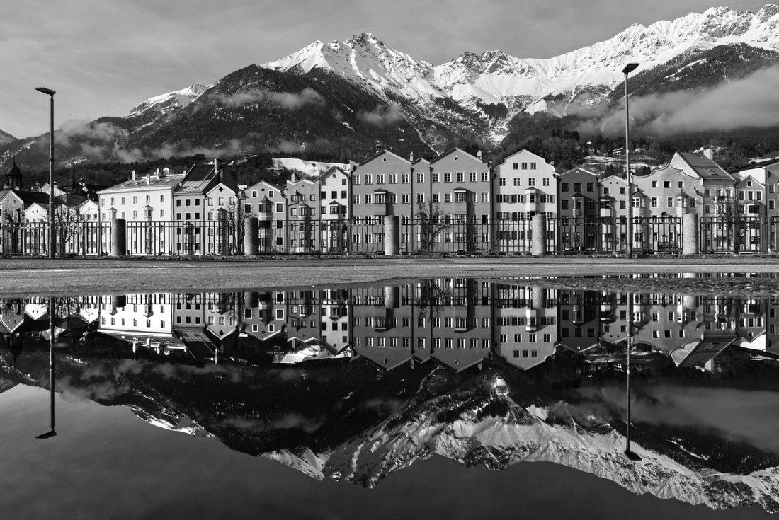 Water reflection of the distinctive colored house fronts of the Mariahilf district and Nordkette of Innsbruck, Austria captured from Marktplatz. This is the famous view of Innsbrucks cityscape 2000pc PuzzleBlack and White