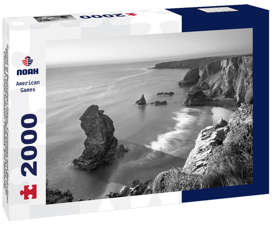 Sunset at Bedruthan Steps. Carnewas and Bedruthan Steps is a stretch of coastline located on the north Cornish coast between Padstow and Newquay, in Cornwall, England, United Kingdom 2000pc PuzzleBlack and White
