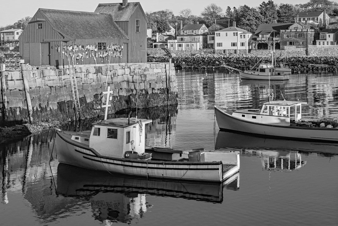 Rockport harbor in Massachusetts with its lobster boats and village reflected in the still water at day. The colors give the town a nostalgic feel 2000pc PuzzleBlack and White