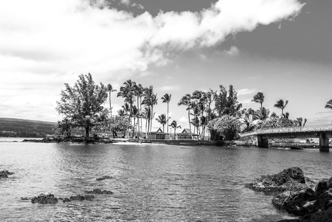 Coconut Island Hawaii depicts a calm day with gentle waves washing ashore highlighting the tropical climate and look of paradise 2000pc PuzzleBlack and White