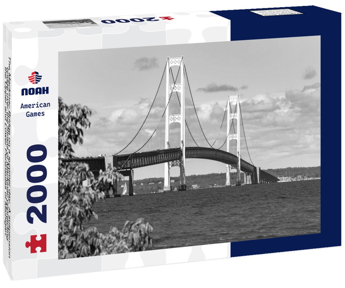 The Mackinac Bridge on a summer day. A suspension bridge over the Straits of Mackinac connecting the Upper and Lower Peninsulas of Michigan. Puff clouds in the blue sky 2000pc PuzzleBlack and White