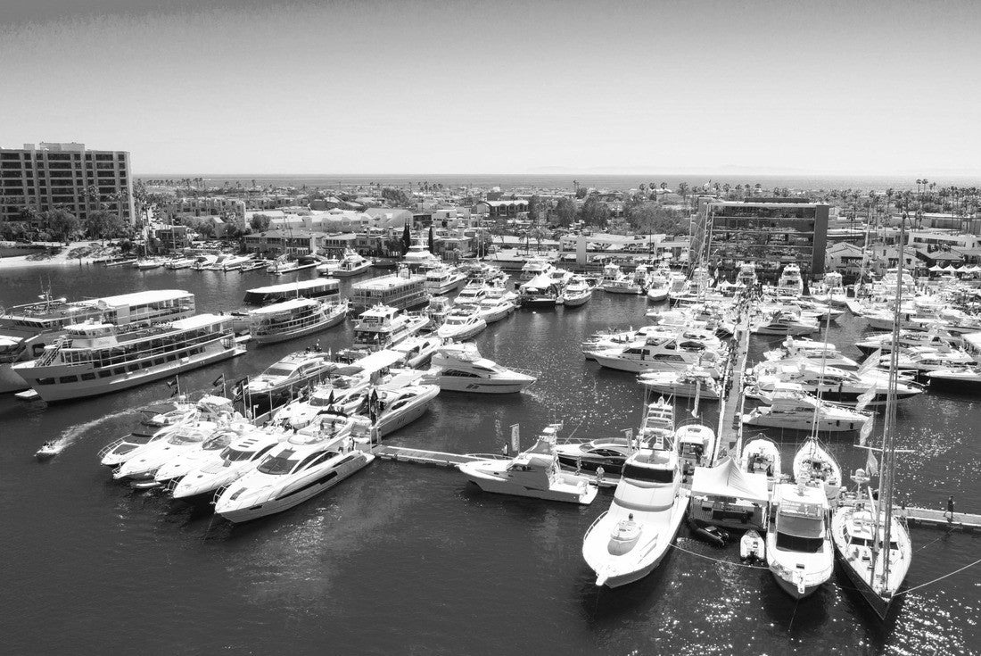 Cinematic aerial view over the Newport Beach harbor during the annual boat show with luxury yachts, boats and Duffy boats on a sunny blue sky day 2000pc PuzzleBlack and White