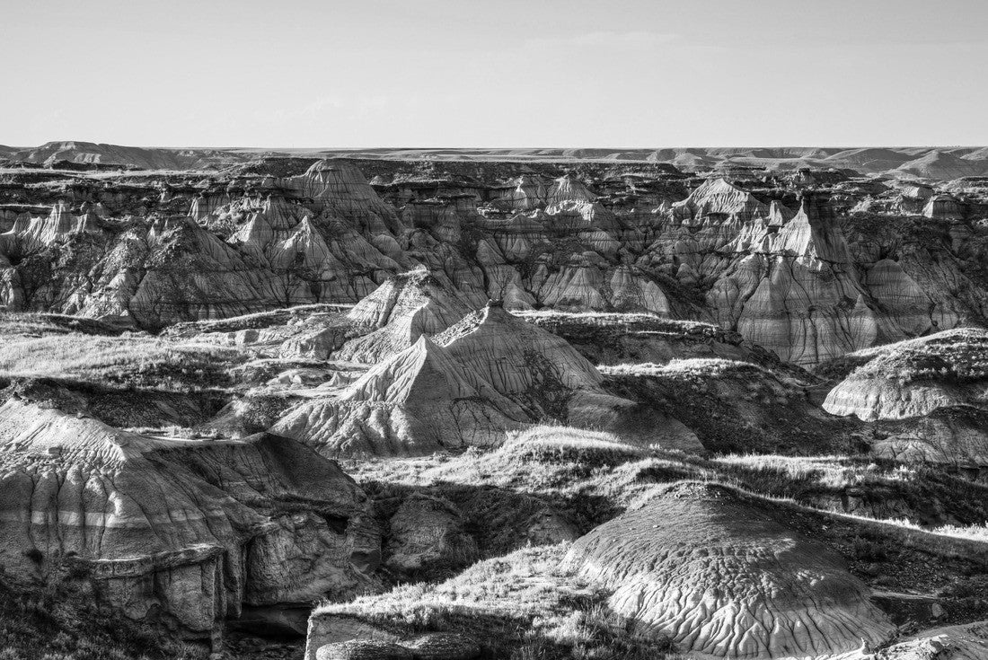Sunset over Dinosaur Provincial Park, a UNESCO World Heritage Site in Alberta, Canada. The Alberta badlands are known for being one of the world's richest dinosaur fossil sites 2000pc PuzzleBlack and White