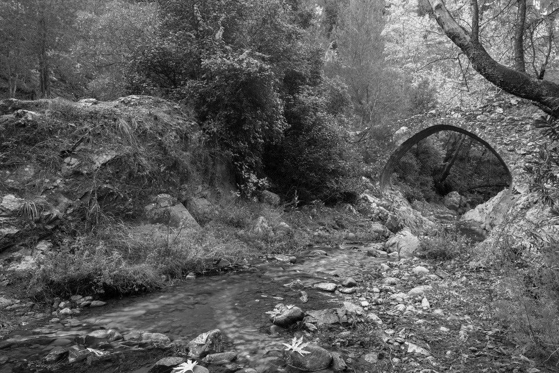 Medieval stoned bridge water flowing in the river in autumn. Elia Bridge Troodos mountains 2000pc PuzzleBlack and White