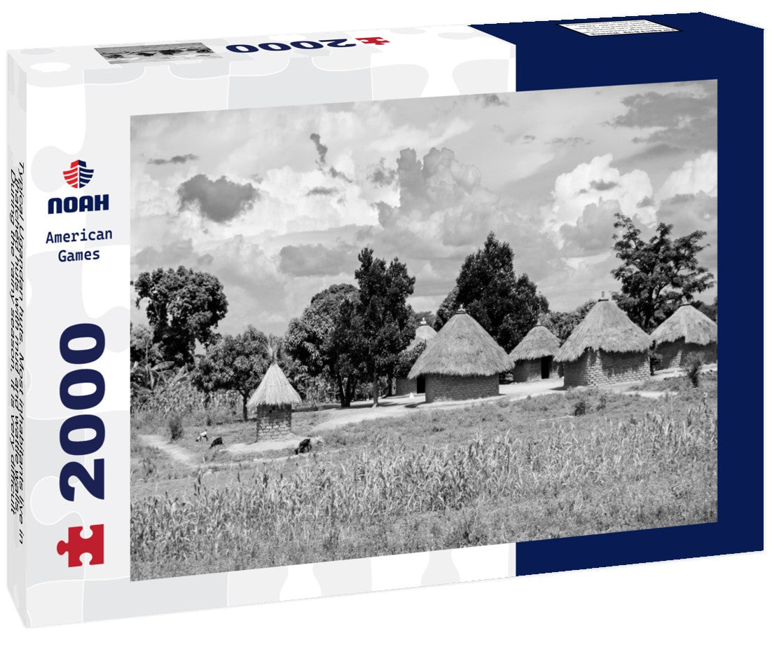 Typical Ugandan huts. Most inhabitants live in thatched huts with mud and wattle walls. During the rainy season, it is very difficult to keep the huts stable and dry 2000pc PuzzleBlack and White
