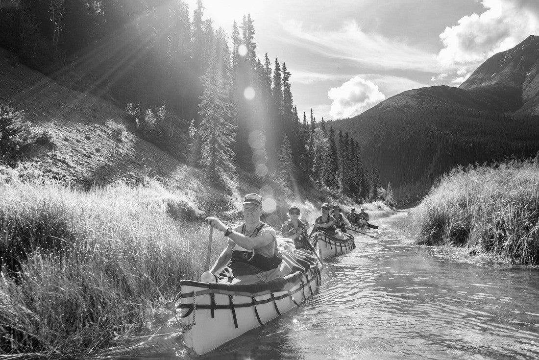 Group paddling down the whitewater of the Nahanni River in the Northwest Territories 2000pc PuzzleBlack and White