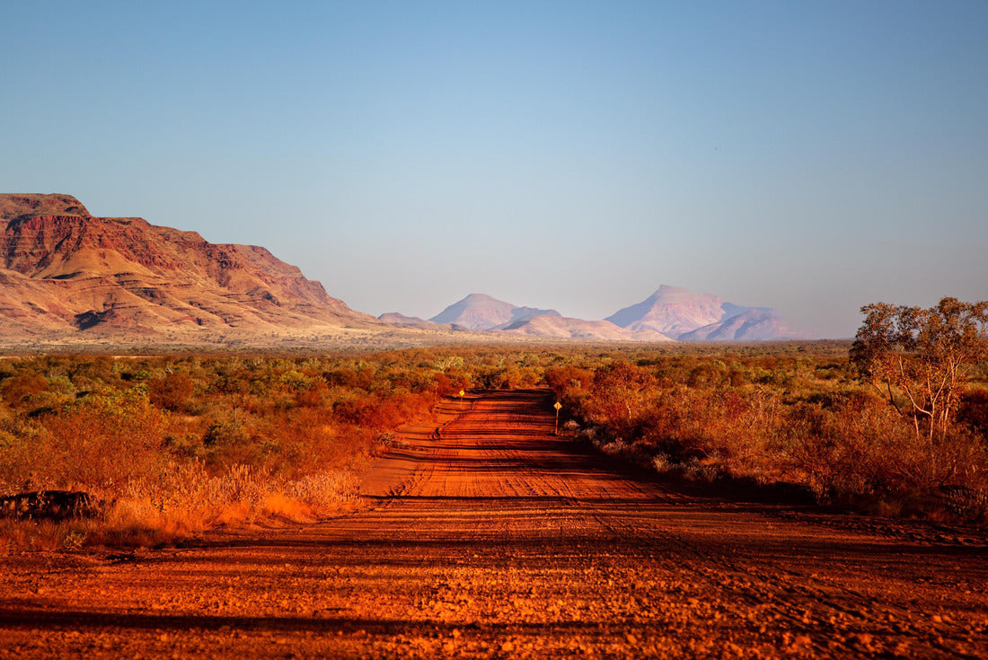 One of the most beautiful red dirt-roads in the Karijini National Park in Western Australia at sunset 2000pc Puzzle