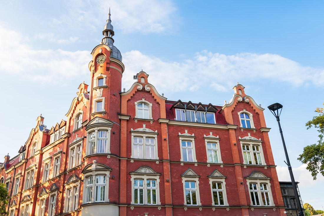 The building of the town hall from 1904. Red brick facade. Beautiful blue sky. The richly decorated facade of the accommodation house. Siemianowice Slaskie, Poland 2000pc Puzzle