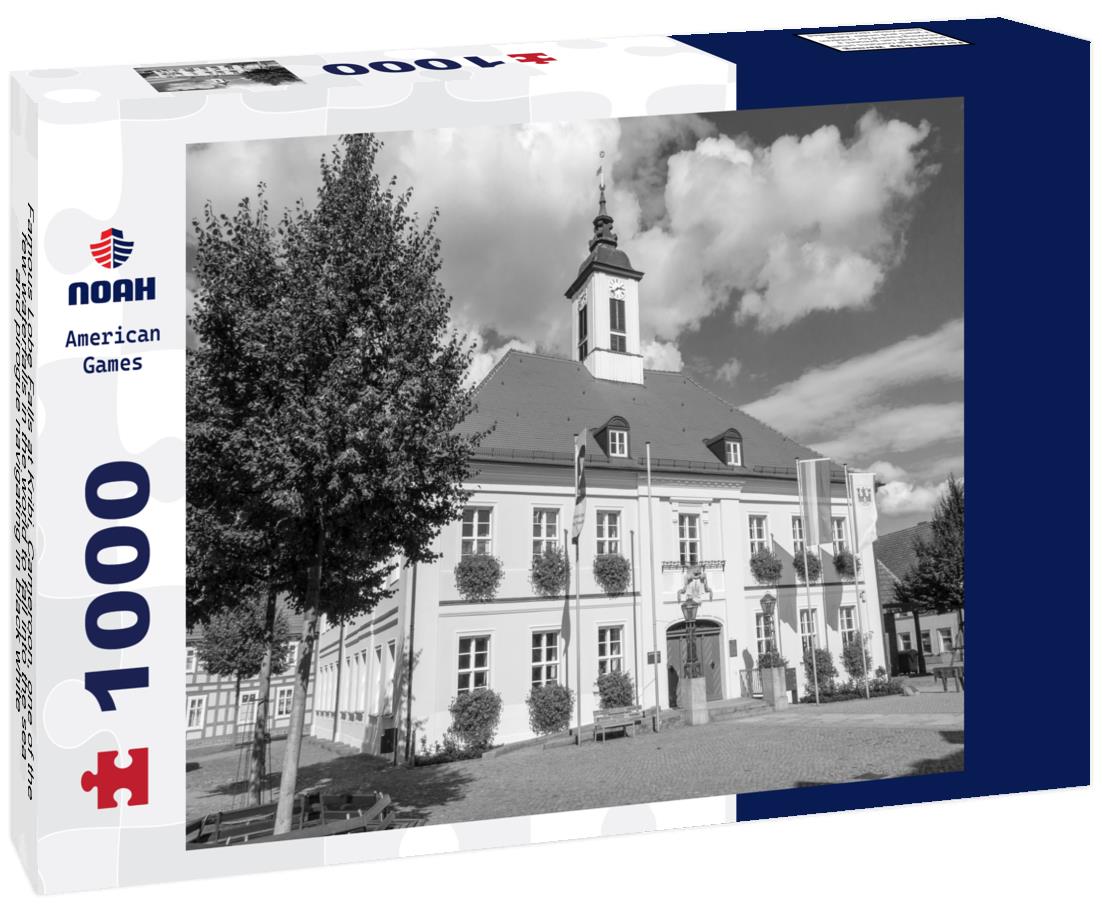 Noah Jigsaw Puzzle Famous Lobe Falls at Kribi, Cameroon, one of the few waterfalls in the world to fall into the sea, and pirogue navigating in black white 1000 pieces