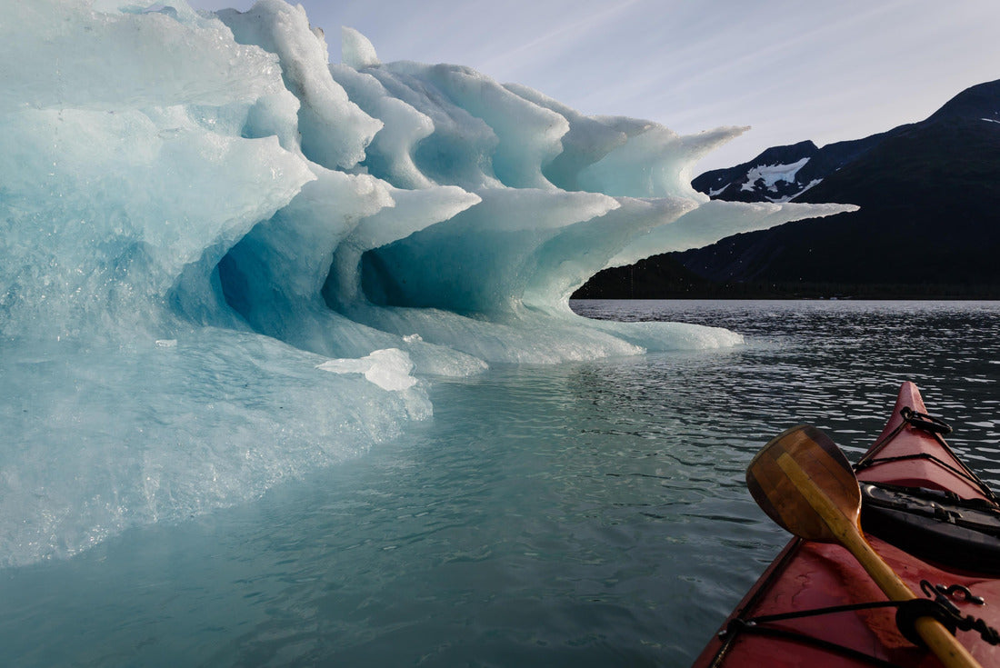 Paddler lashes paddle to kayak to pause journey to enjoy the splendor of the shapes of the melting Iceberg in summertime Alaska's Kenai Fiords National Park 2000pc Puzzle