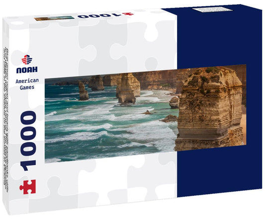 Noah Jigsaw Puzzle Blue green ocean and beach with sandbanks cliffs and waves with close view of The twelve apostles and cliffs in the shadow of the sunset in Victoria, Australia against a orange cloudy sky panorama 1000 pieces