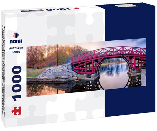 Noah Jigsaw Puzzle Arching Pink Wooden Bridge and Reflections over the Pond at Elm Park in Worcester, Massachusetts. Tranquil Sunset Landscape over the Mirror Like Lake Water. Asian Style Architecture in American Town panorama 1000 pieces