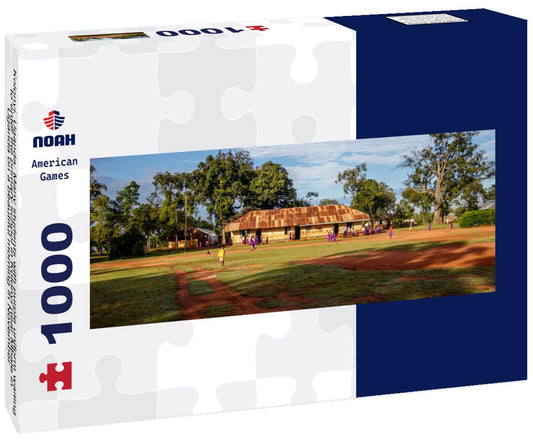 Noah Jigsaw Puzzle Kolonyi, Uganda: Many students with purple uniform waiting to enter the primary school in Kolonyi near Mbale in Uganda on a beautiful morning in November panorama 1000 pieces