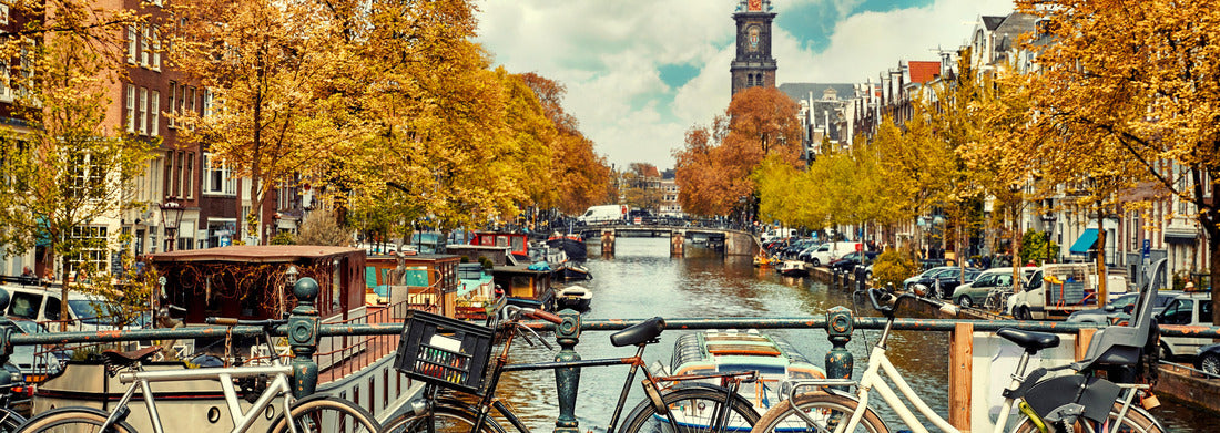 Noah Jigsaw Puzzle bicycle over canal Amsterdam city. Scenic landscape in the Netherlands overlooking the river Amstel panorama 1000 pieces