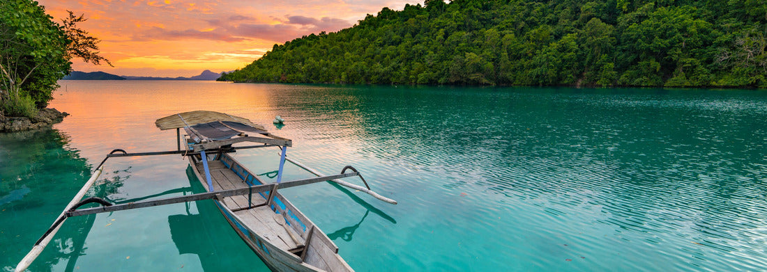 Noah Jigsaw Puzzle Togean Islands, Indonesia Sunset over the Caribbean Sea, dramatic sky, traditional boat floating on a blue-green lagoon in the Togean Islands, Sulawesi, travel destination in Indonesia panorama 1000 pieces