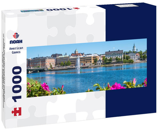 Noah Jigsaw Puzzle The city of Harnosand in north part of Sweden. Flowers and lake in foreground. Center in background panorama 1000 pieces