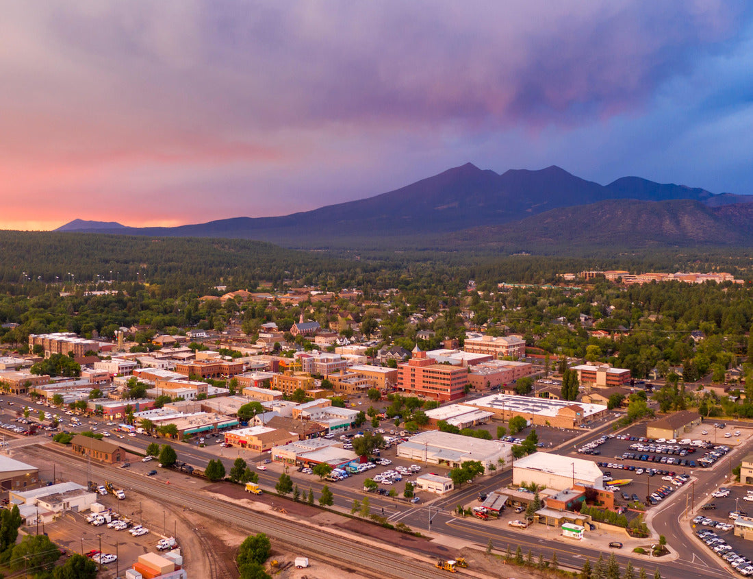 Noah Jigsaw Puzzle Blue and Orange color swirls around in the clouds at sunset over Flagstaff Arizona 1000 pieces