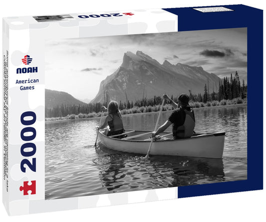 Noah Jigsaw Puzzle Some adventurous friends are canoeing in a lake surrounded by the Canadian mountains. Colorful sunrise sky art render. In Vermilion Lakes, Banff, Alberta, Canada in black white 2000 pieces