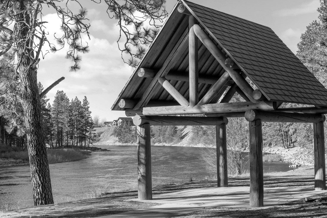 In the city of Post Falls Idaho in the northwest of the United States, a log gazebo or outdoor structure built along the Spokane 2000pc PuzzleBlack and White