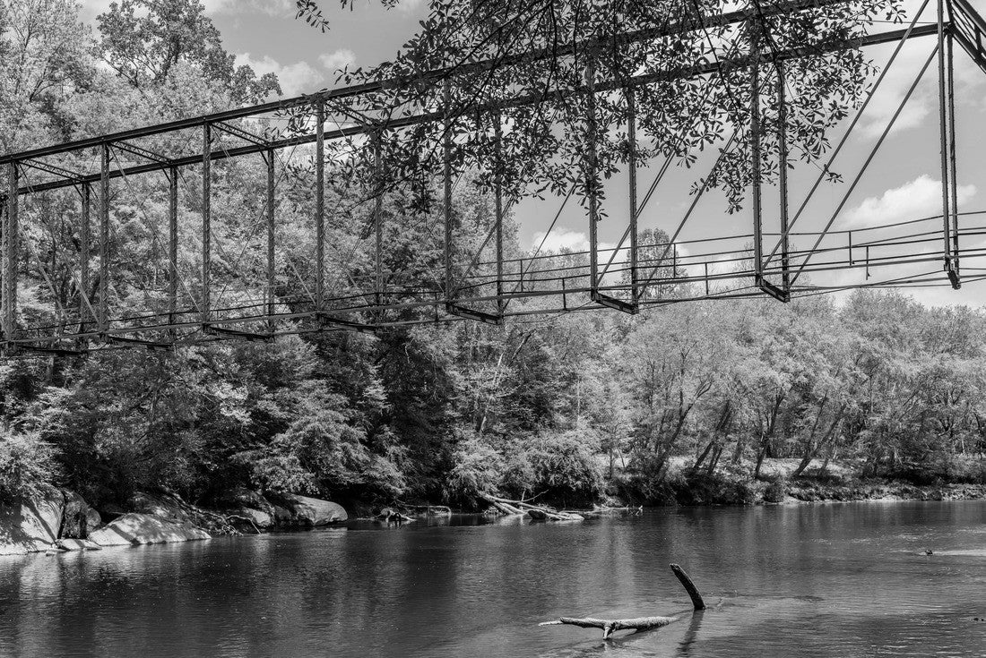 Old iron foot bridge stretching across the Chattahoochee river at Settles Bridge Park in Gwinnett County Georgia 2000pc PuzzleBlack and White