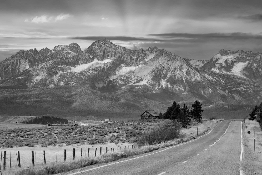 Sawtooth Mountains and log cabin at sunrise and highway 75 leading to Stanley, Idaho 2000pc PuzzleBlack and White