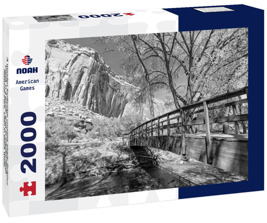 Noah Jigsaw Puzzle A wooden footbridge crosses shady Sulphur Creek in a picnic area in Capitol Reef National Park, Utah in black white 2000 pieces