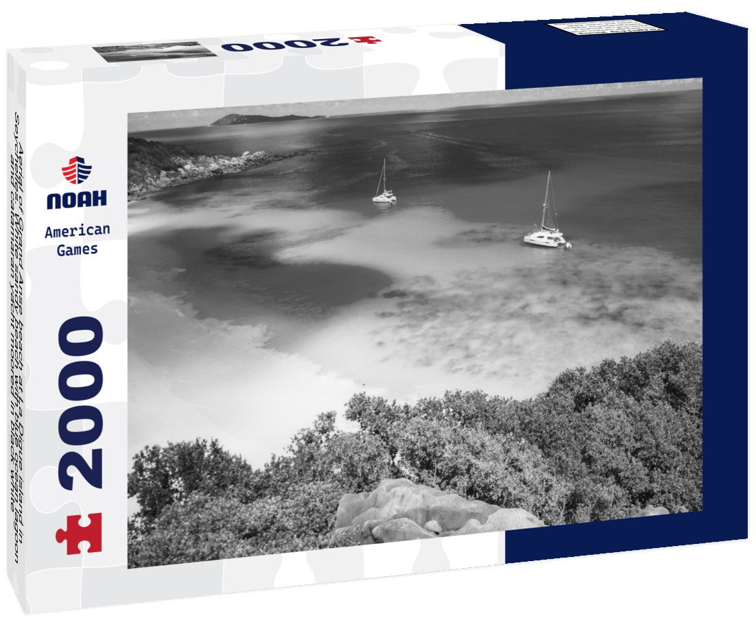 Aerial of Grand Anse beach at La Digue island in Seychelles. White sandy beach with blue ocean lagoon and catamaran yacht moored 2000pc PuzzleBlack and White
